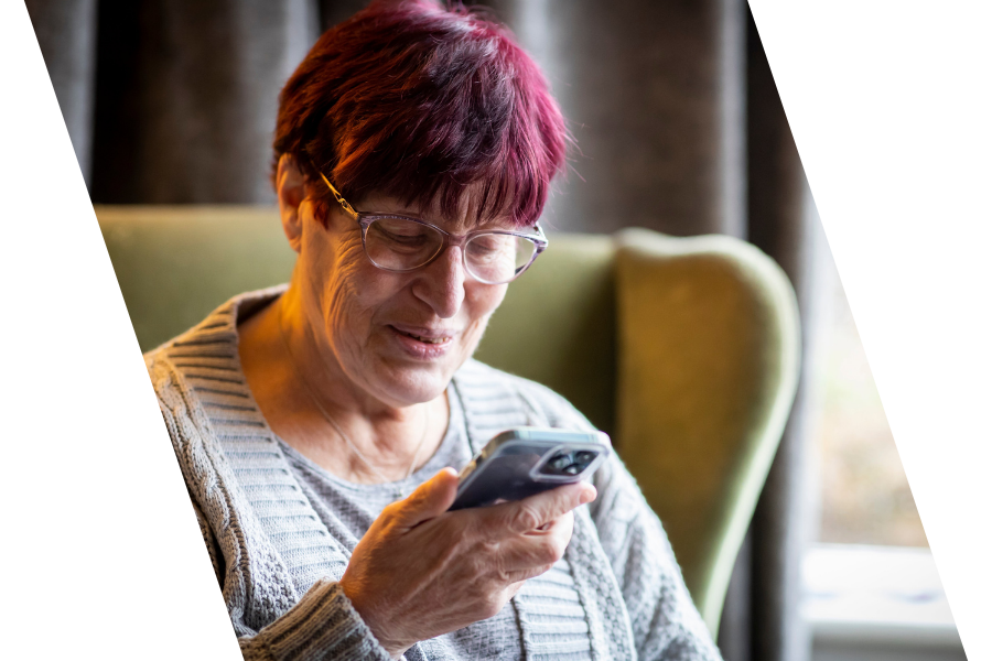 An older woman using a smartphone